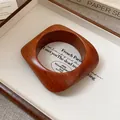 Close-up of vintage wooden bangle showing natural grain and square silhouette - Rounded Square Retro Style / Dark Coffee