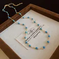 Bohemian gold chain necklace with turquoise blue faceted beads and gold spacers - Style 9 Necklace / Gold Beaded