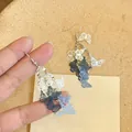 Eleganti orecchini a goccia a farfalla traforati blu e bianchi per donne gioielli - Stile Nappa a Farfalla / Gradiente Blu