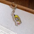 Detailed view of a cute banana cat acrylic keychain with a pink drink cup and metal clip. - Pink Bottle Banana Cat / Silver