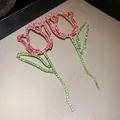 Macro view showing the sparkling pink and green rhinestone details of tulip flower earrings - Tulip Full Rhinestone Drop Style / 925 Silver Needle / Pink-Green