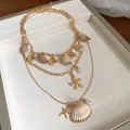Bohemian multi-layer gold chain necklace with natural shells and starfish charms - Style 27 Necklace / Gold and Shell