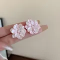 Macro view of pink pearlescent flower stud earrings with delicate petal details - 28# Layered Pearlescent Flower Studs (HE25000)