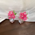 Close-up detail of handmade pink floral bead cluster earrings with a clear faceted crystal drop - 36# Seed Bead Pearl Crystal Studs (HE25000)