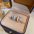 Vintage gold tone earrings with white enamel and sparkling crystals in a jewelry box - Inlaid Double Layer C-Shape Style