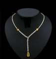 Collier élégant en Y doré avec pendentif goutte en zircon jaune et pierres claires. - Collier (HE14105HN3474) / Jaune