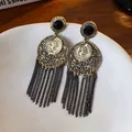 Vintage-style hollow round earrings with long black chain tassels and coin detail. - Silver Earring Post Style / Gold