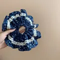 Vintage navy blue floral fabric scrunchie with delicate white lace trim for hair styling - Lace Floral Scrunchie / Blue