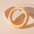 Detail shot of orange marbled resin bangle showing smooth texture and unique patterns - Irregular Marble Pattern Style (2#) / Beige