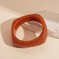 Close-up of irregular amber resin bangle with minimalist vintage design and smooth texture - Rounded Square Quicksand Pattern Style (8#) / Brown