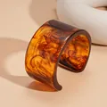Macro detail of irregular amber resin cuff bracelet with brown marble swirl pattern - Irregular Thick Style (12#) / Brown