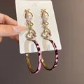 Vista dettagliata di un set di orecchini a cuore e perle con cerchi leopardati rosa - 11# Perno in argento - Oro