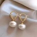 Elegant French vintage gold pearl drop earrings with crystal accents on a silk background - Heart Drop (16#)