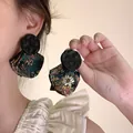Close-up of retro New Chinese style earrings with wooden studs and green brocade pendants. - 10# Silver Post - Black