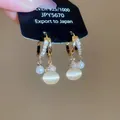 Elegant silver pin gold hoop earrings featuring cat eye stone and pearl drop beads - Cat Eye Stone Pearl Pendant Style / Gold