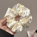 Elegant cream-colored satin scrunchie with black polka dots for stylish hair styling - 9 Hair Scrunchie - White