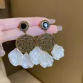 Exquisite vintage gold-tone drop earrings featuring pearly white flower petals and black studs - 3# Silver Needle - Long Tassel Gold White