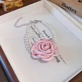 French style pearl necklace with a large pink fabric rose detail, macro close-up view - Bracelet / Pink