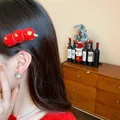 Festive red flocked duckbill hair clip with gold accents for New Year celebration - Duckbill Hair Clips / 1 Piece / Red Three Balls