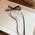 Detail showing elegant black ribbon bow hair clip with grey faceted crystal beads. - Bowknot Duckbill Clip / 1 Piece / Black Ribbon Grey Crystal