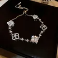 Elegant minimalist four-leaf clover zircon bracelet with adjustable silver-tone slider chain - Silver Flower (26#)
