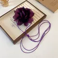 Elegant purple fabric flower necklace with a long slender cord for a sweet French style - Extra Long Necklace / Purple