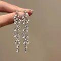 Detailed view of elegant silver flower tassel earrings featuring sparkling clear crystals - Marquise Rhinestone Tassel (3#)
