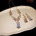 Vintage gold-toned necklace and earrings jewelry set with sparkling pear-cut crystals - 75# Necklace - Gold - White - Two-piece Set