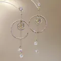 Close-up of rattan woven hoop earrings with sparkling crystals and faceted beads - 28# Gold Coffee