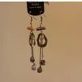 Macro view of vintage bronze dangle earrings with wooden segments and marble stone drops - 29# Coffee