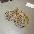 Elegant multi-layered gold circle hoop earrings with surgical steel needles for women - Gold