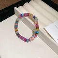 Handmade ethnic style colorful heishi beaded bracelet with gold spacers on tray - Style 45 / Colorful