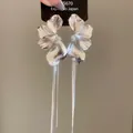 Elegante silberne Blumenohrringe mit langen Quasten und einer schimmernden Metalloberfläche - 43# Silberstift Große Blütenblatt-Quasten-Stil / Silber