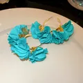 Detailed view of turquoise chiffon flower C-shaped hoop earrings with gold accents - C-Shape Floral Style (HE30814) / Green