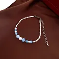 Elegant ethnic style beaded bracelet with light blue and white crystals and silver spacers - Faceted Metal Bead with Lobster Clasp Style (Style 82) / Silver-Blue