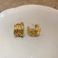 Detailed macro view of gold multi-layered intertwined wire geometric hoop earrings - 3# Silver Needle - Gold