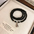 Multi-layer black crystal beaded wrap bracelet with silver money bag charm - Style 87 Bracelet / Black