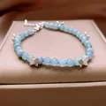 Exquisite light blue crystal beaded bracelet featuring delicate silver butterfly charms - 142 Style / 10mm (16 Beads) / Blue