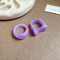 Close-up of purple marbled resin geometric and circular rings on retro background - Two-Piece Set / 24# Purple