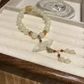 Elegant New Chinese style beaded bracelet with light green jade-like stones and flower pendant - Jade-Look Petal Pendant Style (207) / One Size / White