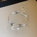 Elegantes silbernes Perlenarmband mit funkelnden Mond- und Sternanhängern und grauen Perlen. - 54# Armband-silber-mond