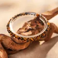 Natural tiger eye gemstone beaded bracelet with ethnic style on a rustic wood display - Tiger Eye Round Bead Style (102#) / 4mm / Brown