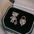 Sparkling silver stud earrings featuring a crystal teddy bear and heart lock design - Asymmetric Bear Lock (49#) / Silver