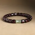 Elegant Chinese style wooden bead bracelet featuring a pale green jade-like accent bead - Wooden Barrel Bead Style (204) / One Size / Dark Red