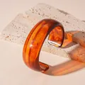 Chic acrylic marbled amber wide wave cuff bangle with artistic swirled pattern finish - Style 5