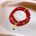 Elegant red beaded double-strand bracelet with prosperity charm on satin fabric - Double-Layer Beaded Bracelet (211) / Exquisite Gift Box / Red
