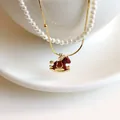 Elegant double-layer necklace with red enamel rocking horse pendant and pearls - Necklace Set - 33# Double Layer Pearl Snake Chain Red Enamel Horse
