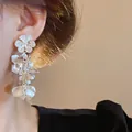 Élégantes boucles d'oreilles pendantes à fleurs argentées avec textures de pétales pour femmes - Fleur d'Argent (4#)