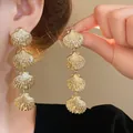 Longues boucles d'oreilles en coquillage doré avec quatre festons métalliques étagés - Style Pendant Coquille (11#)