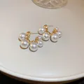 Elegant French style pearl hoop earrings with gold-tone base and silver needle studs - White Artificial Pearl C-Hoop